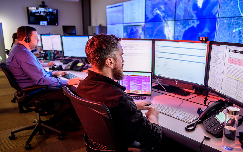 Staff at work in the network operations center on IU Bloomington campus